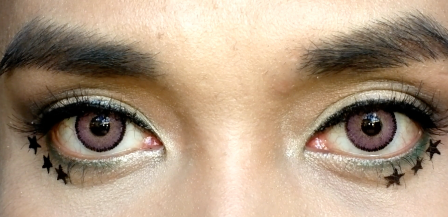 pink lenses on brown eyes